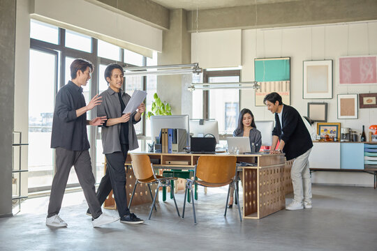 A team of business professionals working diligently in the office