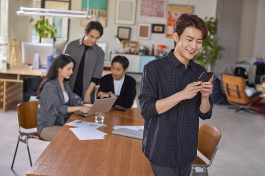 A team of business professionals working diligently in the office