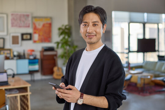 Confident businessman standing poised in the office