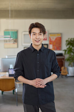 Confident businessman standing poised in the office