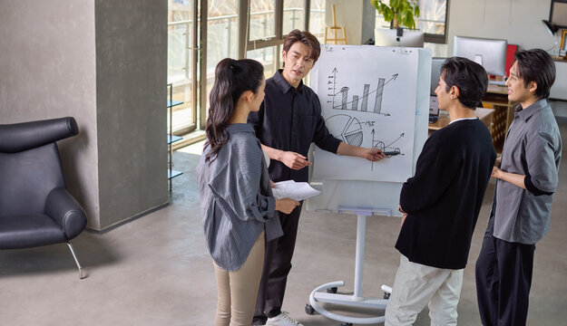Business colleagues discussing strategies during an office meeting