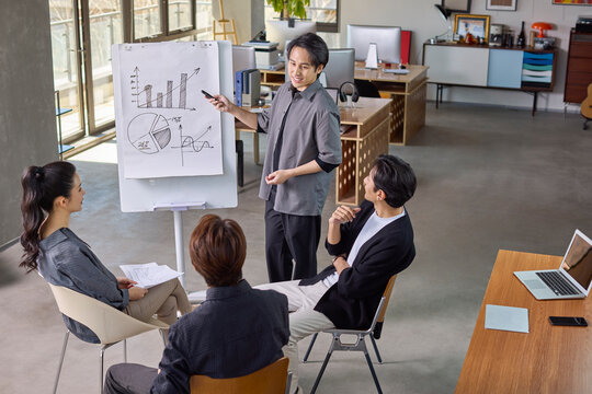 Business colleagues discussing strategies during an office meeting