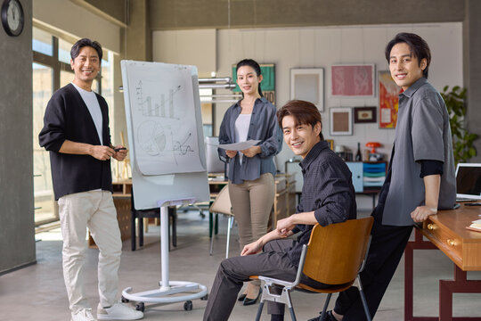 Business colleagues discussing strategies during an office meeting