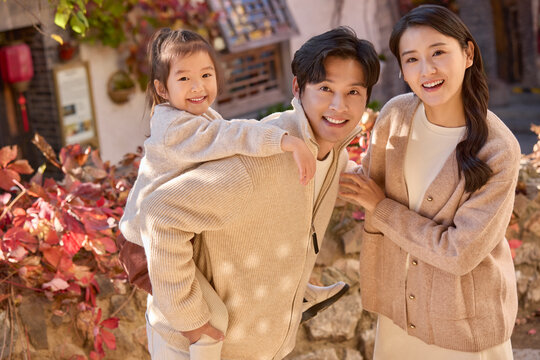 Lovely young family enjoying their trip together
