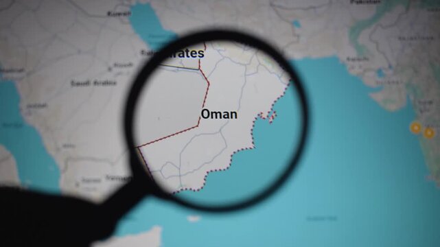 Oman map under magnifying glass highlighting arab region, Iran war tensions near strait of hormuz, USA Israel focus on crude petroleum gas routes, trade flows, tariff risks, maritime corridor