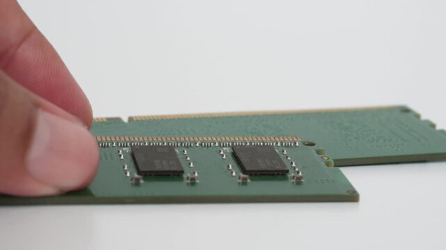 RAM (Random Access Memory) is temporary storage in a computer. RAM is a computer hardware component. RAM with a white background.