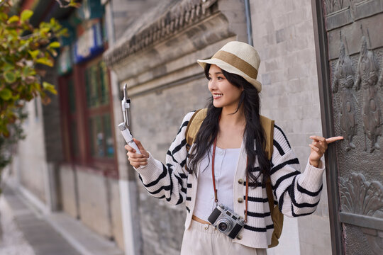 Young woman discovers the magic of Beijing