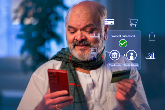Indian senior man and grandson doing online digital payment successful on laptop for kids education and household savings to promote financial literacy in digital india concept