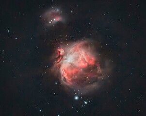 Detailed view of the Orion Nebula M42 showing vibrant gas clouds and stellar formation in deep space. © The Hiker's Eye