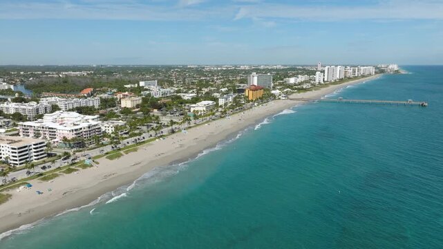 Aerial View of Deerfield Beach Pier With Waterfront, Residential Blocks, Roads and Ocean Horizon