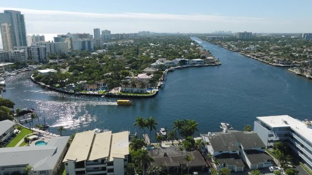Aerial View of Pompano Beach With Pier, Bridge, Boats, Waterfront, Residential Blocks, Roads and Ocean Horizon