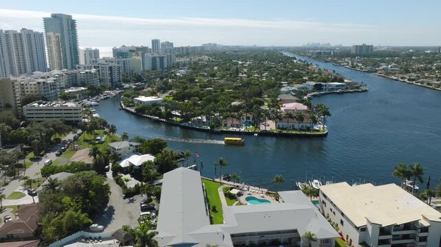 Aerial View of Pompano Beach With Pier, Bridge, Boats, Waterfront, Residential Blocks, Roads and Ocean Horizon