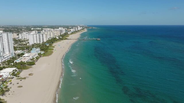 Aerial View of Pompano Beach With Pier, Bridge, Boats, Waterfront, Residential Blocks, Roads and Ocean Horizon