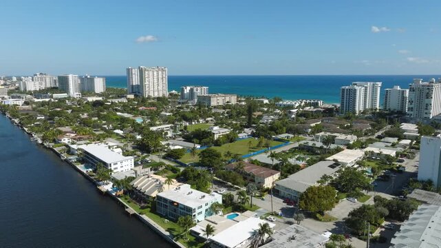 Aerial View of Pompano Beach With Pier, Bridge, Boats, Waterfront, Residential Blocks, Roads and Ocean Horizon