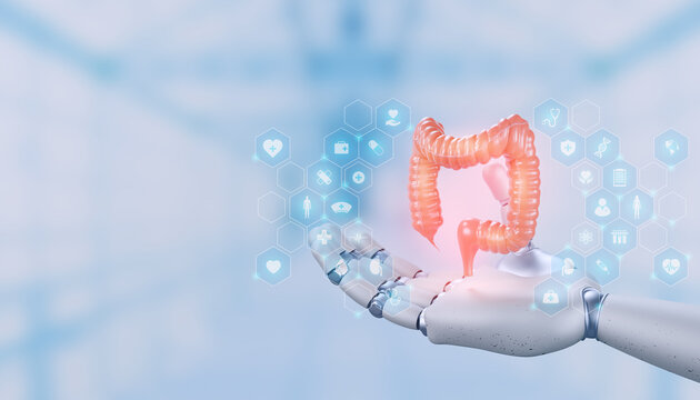 Robotic hand holding 3D human large intestine. AI medical technology, digital endoscopy & innovation in coloproctology. Colorectal cancer detection concept. Bokeh background.