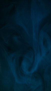 Smoke cloud. Mist splash. Blur blue color flow on abstract background glitter paint fluid shimmer water pigment acrylic art texture.