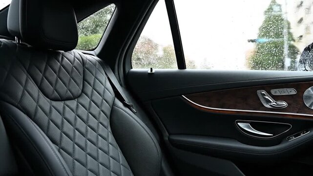 Luxury car interior with black seats.