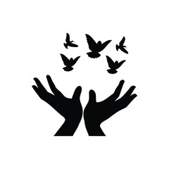 Obraz premium Release of Birds from Open Hands Silhouette