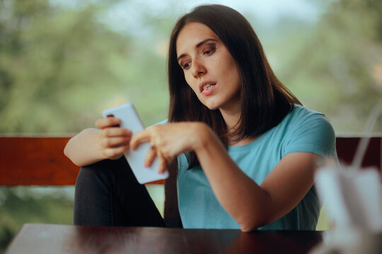 Nostalgic Woman Stalking her Ex on Social Media 
Infatuated girl looks with envy on the internet and stalks her ex-boyfriend