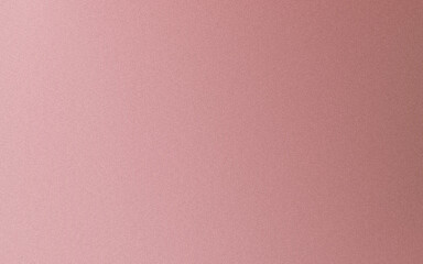Fototapeta premium A close-up view of a textured pinkish fabric surface with subtle graininess