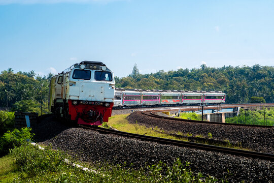Indonesian train that crosses the line in Kulon Progo, Yogyakarta