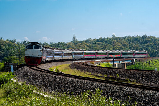 Indonesian train that crosses the line in Kulon Progo, Yogyakarta
