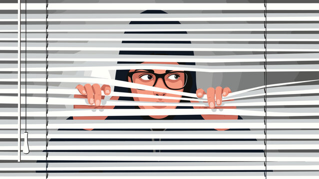 Person wearing glasses and dark hoodie peeking through white window blinds to spy or observe from a hidden position.