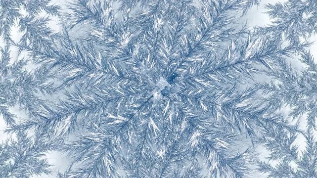 Abstract winter pattern with crystalline snowflake shapes expanding on a green