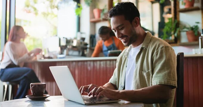 Laptop, typing and man in coffee shop with freelance project for creative career with email. Technology, warm beverage and male editor with computer working on publishing in cafe or restaurant.