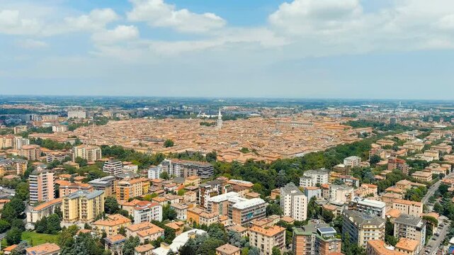 Modena, Italy. General panorama of the city. Historical Center. Summer. Drone footage, Departure of the camera