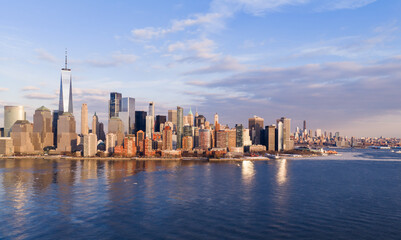 Obraz premium New York City skyline over Hudson River. Manhattan waterfront panorama in New York City. NYC Manhattan skyline. New York downtown cityscape.