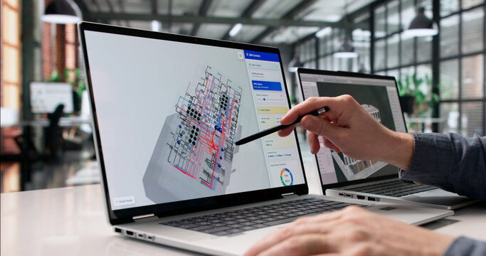 Engineer Diligently Reviews 3D Digital Twin Mapping With Advanced BIM
