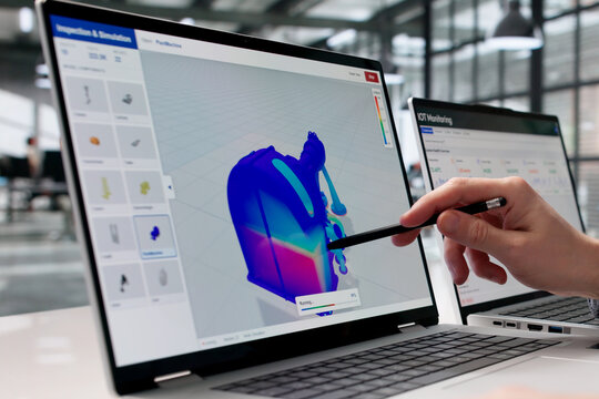 Mechanical Engineer Examines 3D Stress Simulation Data