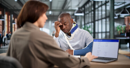 An Injury Lawyer Carefully Helps A Worried Worker Manage Accident Claims