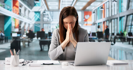 Determined Businesswoman Takes A Moment For Heartfelt Prayer