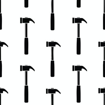 A black and white repeating pattern of hammers and chisels