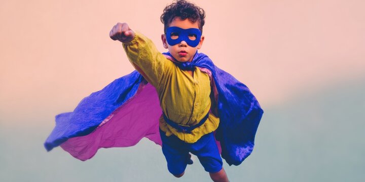Brave Little Superhero Boy Flying in Blue and Yellow Costume with Cape for Childrens Imagination Concept, Brave Character for Storybook or Advertising Design