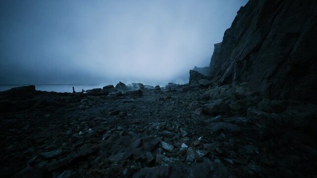 Lonely rocky shoreline under moody horizon, scattered pebbles and shallow tide pools lead to distant sea, cool blue tones and overcast sky, subtle surf