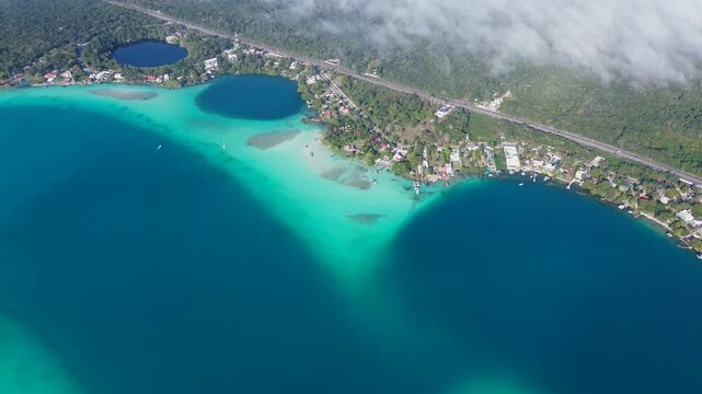 High altitude aerial view of the three cenotes inside Bacalar Lagoon, Mexico