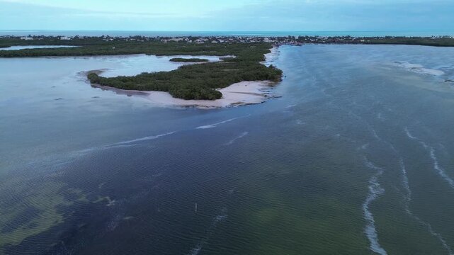 Aerial view approaching Holbox Island with sandbars and mangroves, Mexico