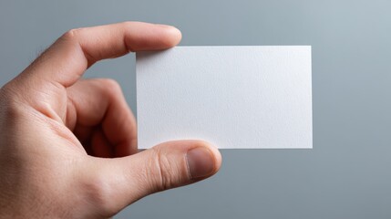 Obraz premium Blank card held for creative design inspiration