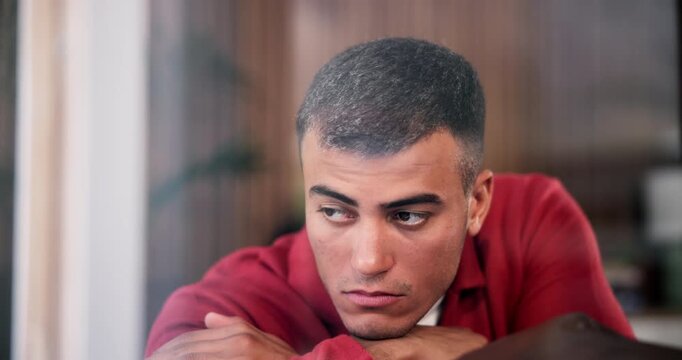 Sad, man and thinking on couch, house and lonely after break up in lounge, memory and mental health. Anxiety, reflection and person with depression, disappointed and heartbroken by toxic relationship