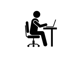 Fototapeta premium Person sitting at desk working on laptop computer