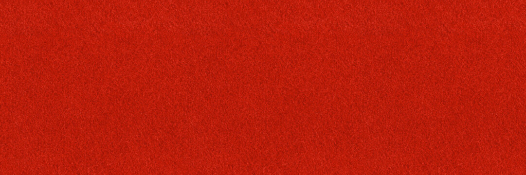 Red fabric seamless backdrop texture. Top view of festive premiere floor. High resolution tileable background.