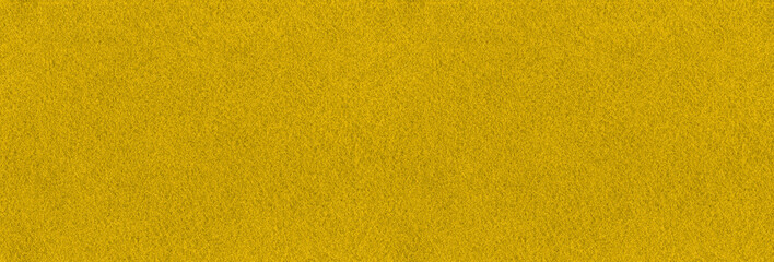 Yellow fabric texture background. Seamless golden cloth interior design pattern. Solid yellow color light backdrop. © Lawrey