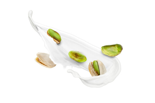 Pistachio Nuts Splashing in Milk on White Background. Great for advertising pistachio products, plant-based milk, healthy snacks, dairy or nut-based beverages, ice cream and dessert branding, 