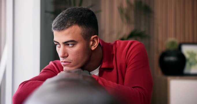 Lonely, man and thinking on couch, house and sad after break up in lounge, memory and mental health. Anxiety, reflection and person with depression, disappointed and heartbroken by toxic relationship