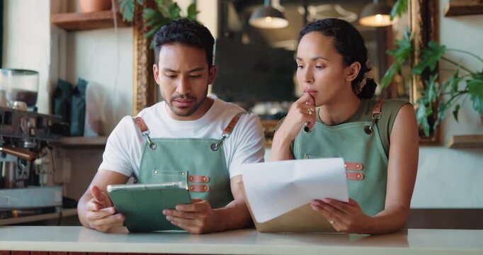 Business owner, stress and people in cafe, documents and tablet for late delivery schedule. Employees, man and woman in restaurant, tech and paperwork for stock order, debt and email for bankruptcy