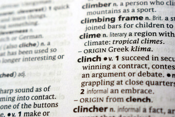 Fototapeta premium English Dictionary Page Close Up With The Word Transcription Of -clinch