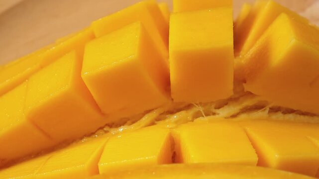 Close-up video of a slice ripe mango	